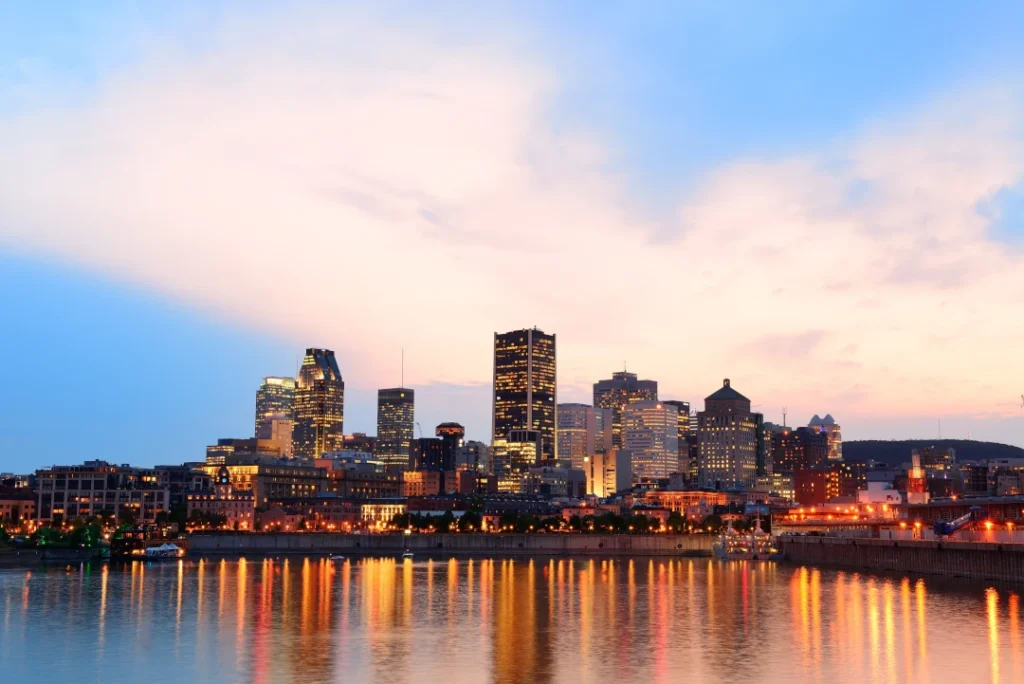 montreal-river-sunset-with-city-lights-urban-buildings