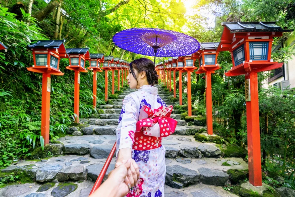 woman-wearing-japanese-traditional-kimono-holding-man-s-hand-leading-him-kifune-shrine-kyoto-japan